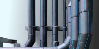 RFQ: HDPE Pipes Water Utility HDPE Piping System Against Light Blue Wall