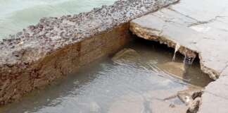 Authorities Assess Bay Road After Partial Sidewalk Collapse Near Thibou Ave. Bay Road